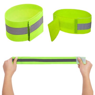 De fluorescente Oranje Weerspiegelende Armbanden voor het Runnen van het Been van Bandelastiekjes binden Groene Veiligheids Lopende Enkel